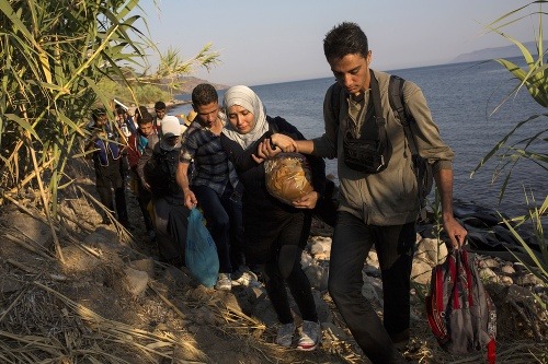Utečenci vylodení na ostrove Lesbos.