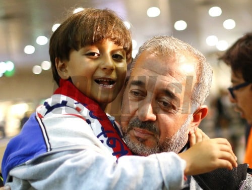Usáma Abdal Muhsin so svojím synom Zajdom