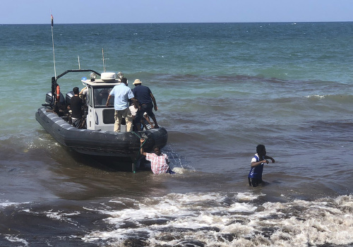 Utečenci zachránení na pobreží