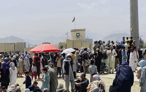 People waiting in front of the airport