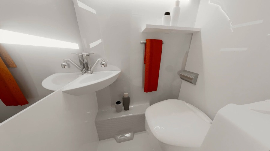 Spodná kúpeľňa je vďaka špeciálnemu WC s otáčacou doskou ideálne kombinovaná so sprchovým kútom. 