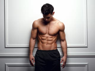 Stylish shirtless man at