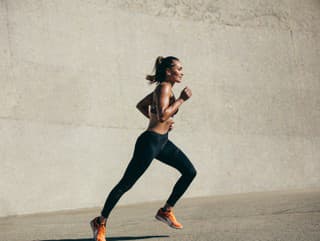 Healthy young woman running