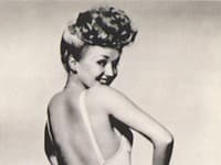 Betty Grable si na postave presýpacích hodín zakladala