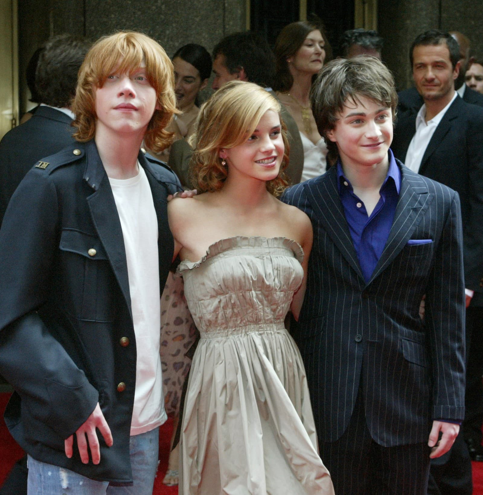 Zľava: Rupert Grint, Emma