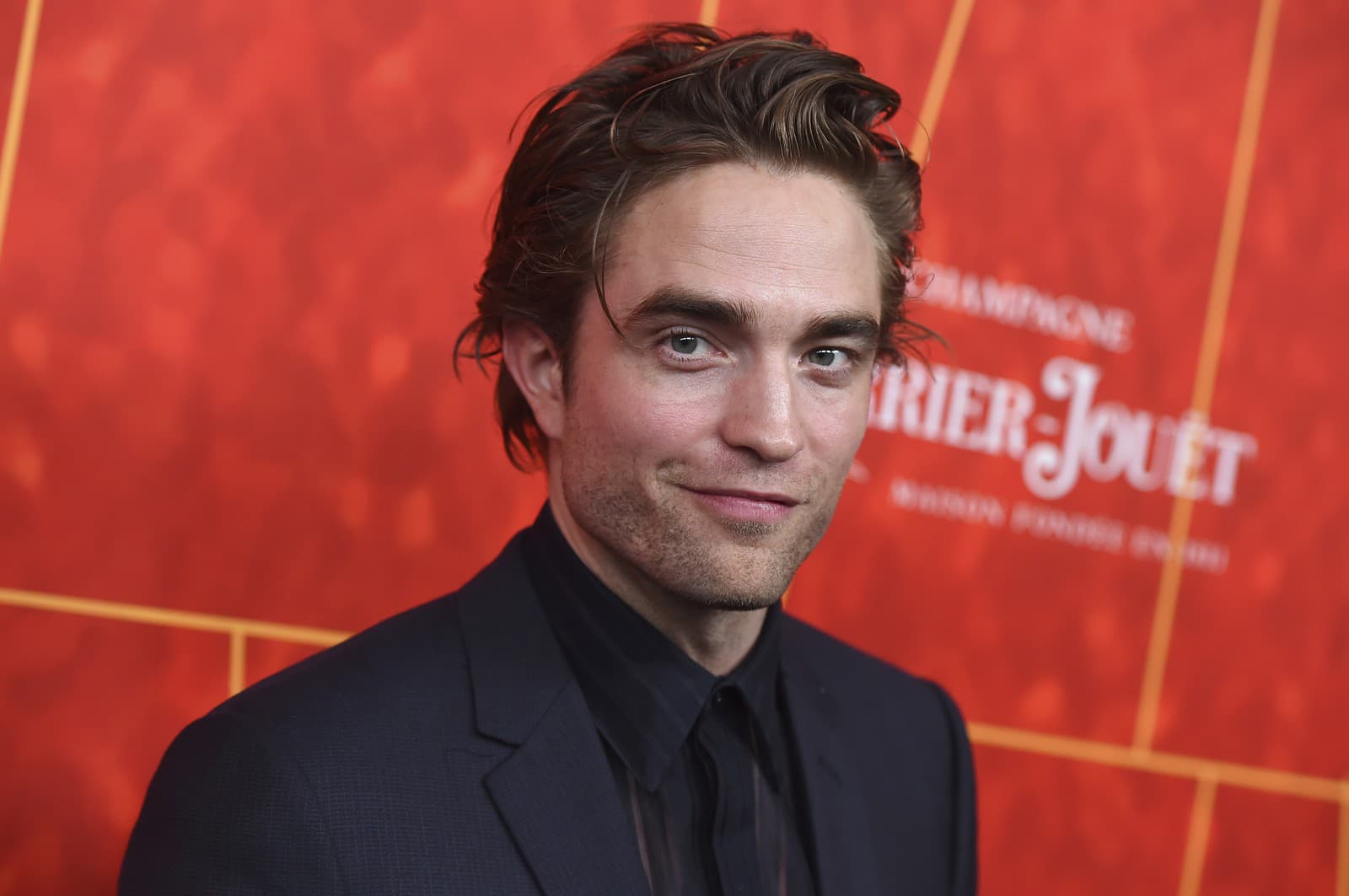Robert Pattinson je známy najmä z Twilight ságy. (Zdroj: SITA/Photo by Jordan Strauss/Invision/AP)