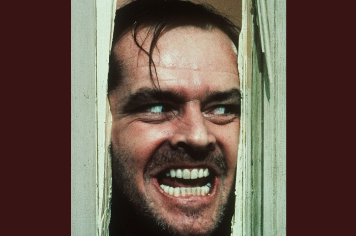 Herec Jack Nicholson v úlohe Jacka Torrancea vo filme režiséra Stanleyho Kubricka Osvietenie (Zdroj: TASR/AP Photo/Warner Bros. Inc.)