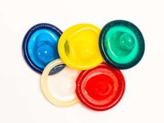 Five colourful condoms on