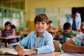 Happy elementary school student