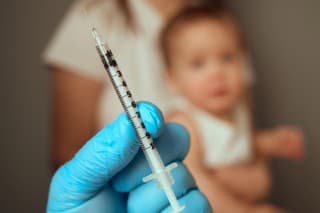 A parent holds a