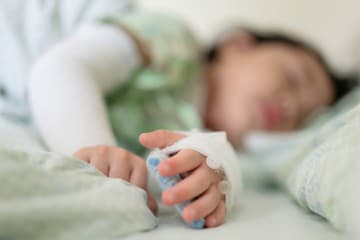Close-up children hand intravenous Close-up children hand intravenous
